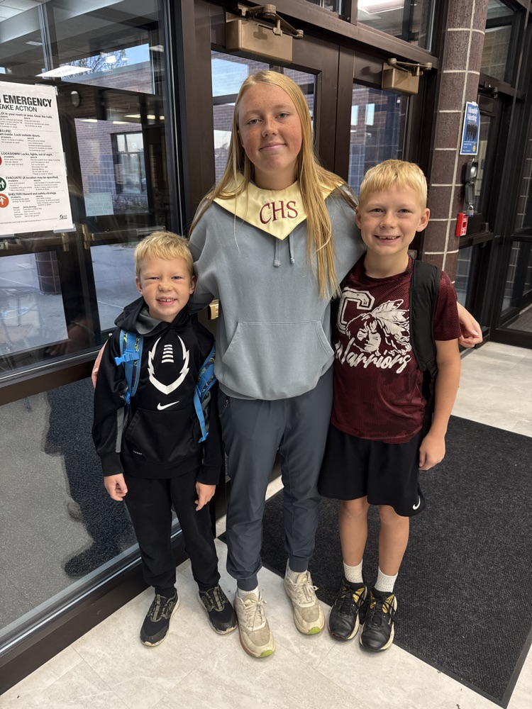 Crofton Chorus member posing with their siblings 
