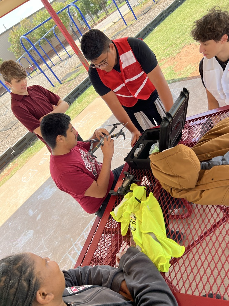 JROTC cadets working with their aerial drone. 