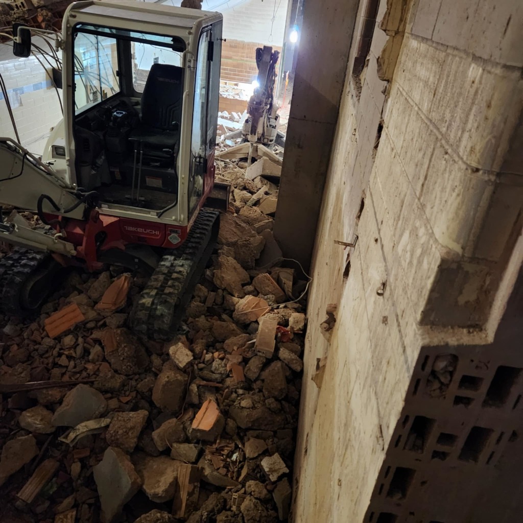 desctruction of walls for storage cubbies