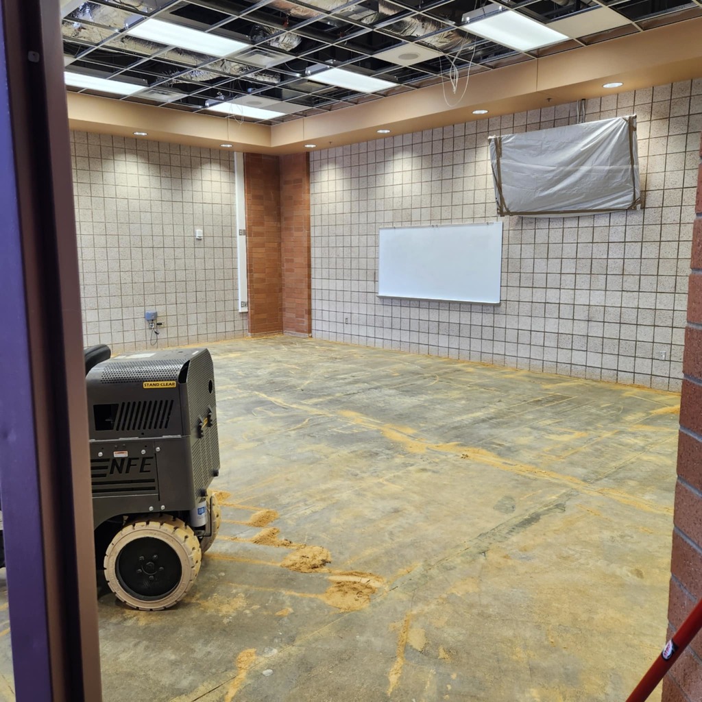 forum room with no flooring