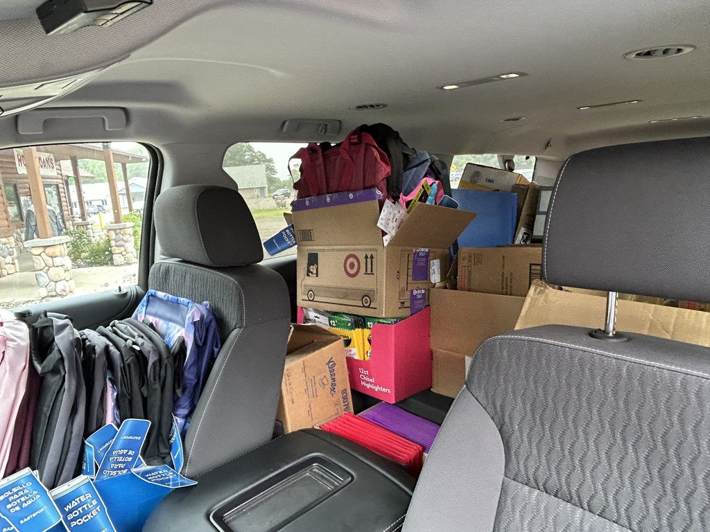 front and back seat filled with school supplies