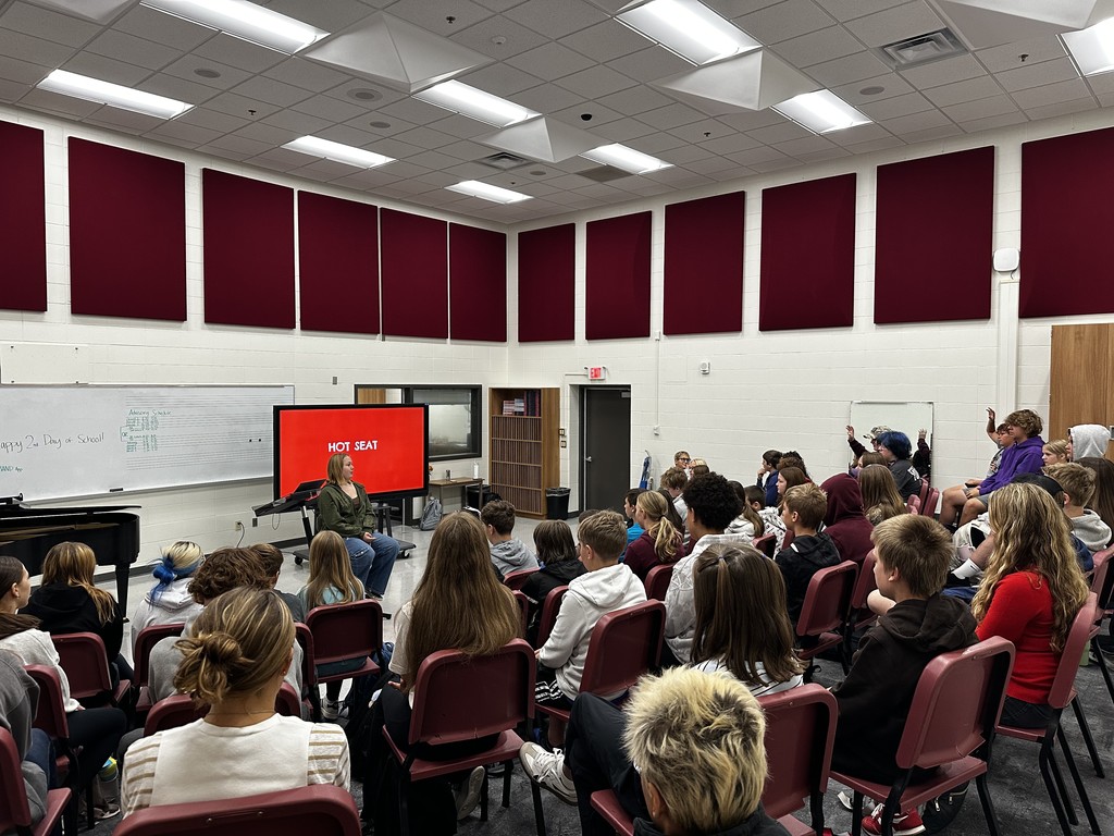 7/8th grade choir students playing hot seat