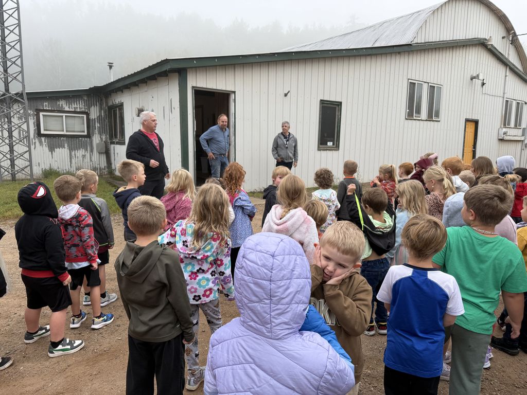 bus drivers talking to kindergartners