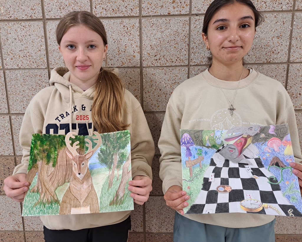 twe females with pop-up art