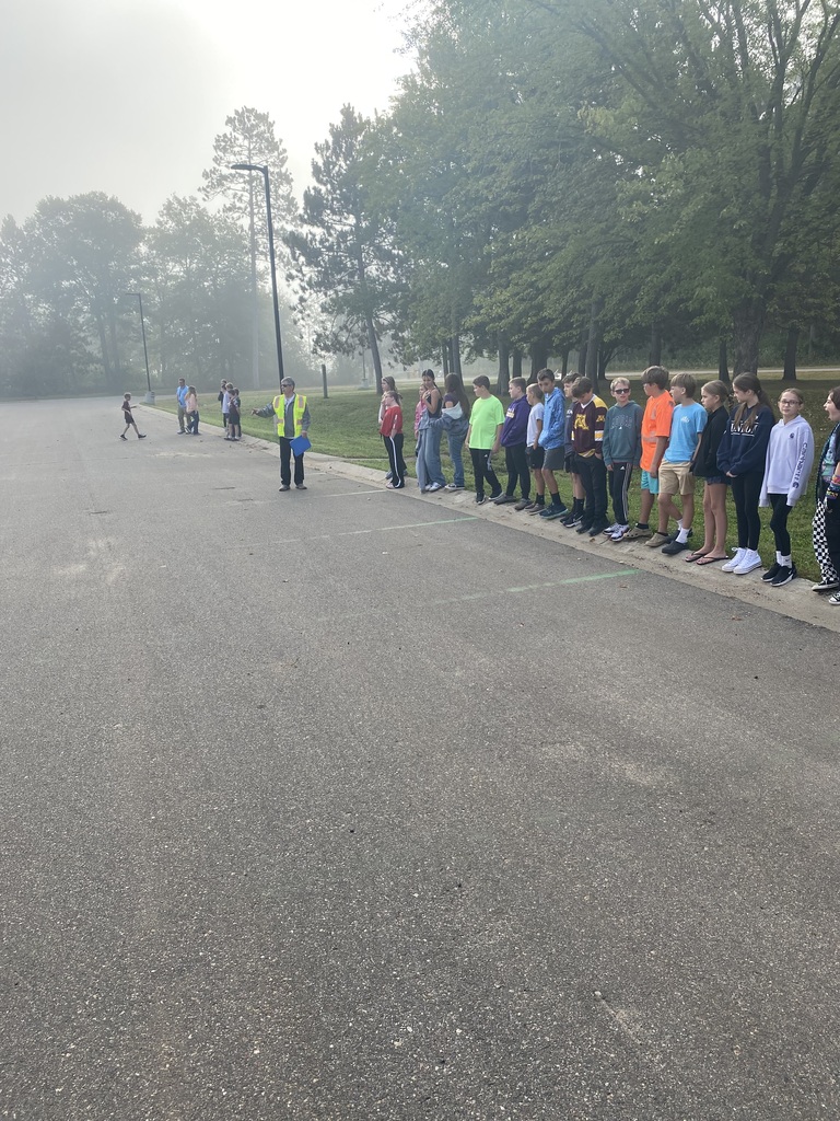 bus driver talking to students