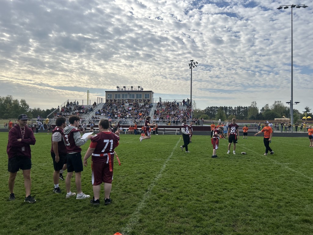 special olympics and their unified partners playing flag football