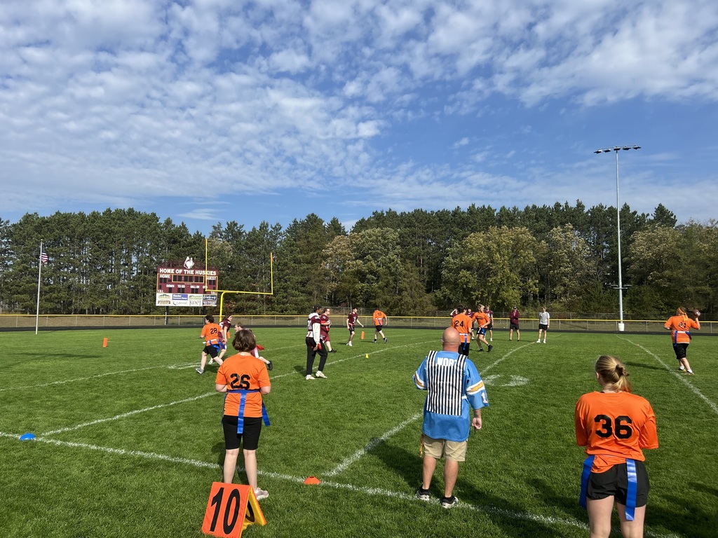 student playing flag football
