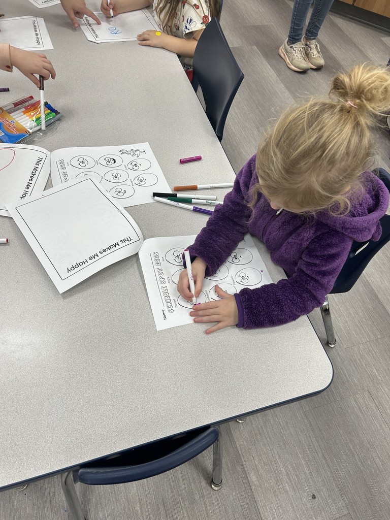 female student working on a worksheet