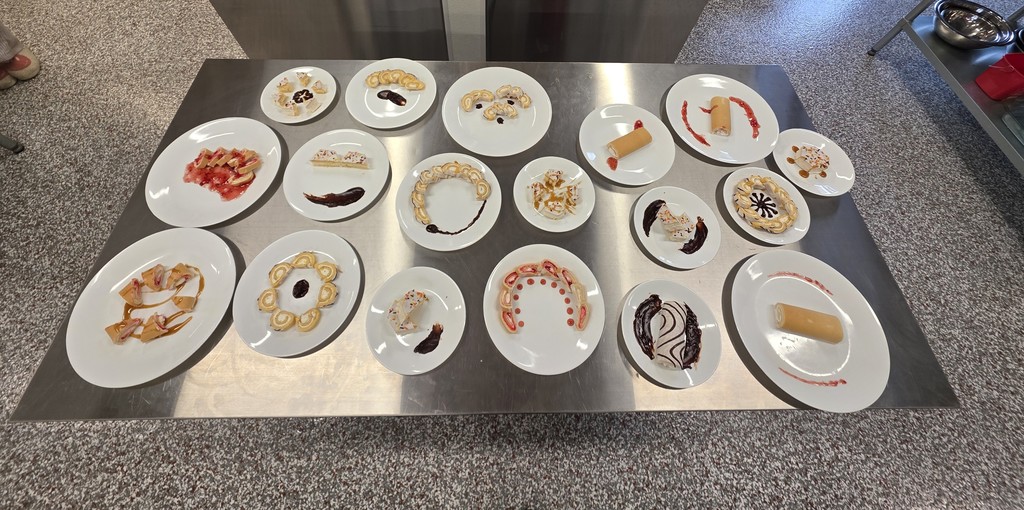 culinary students practiced plating with sauces and snacks