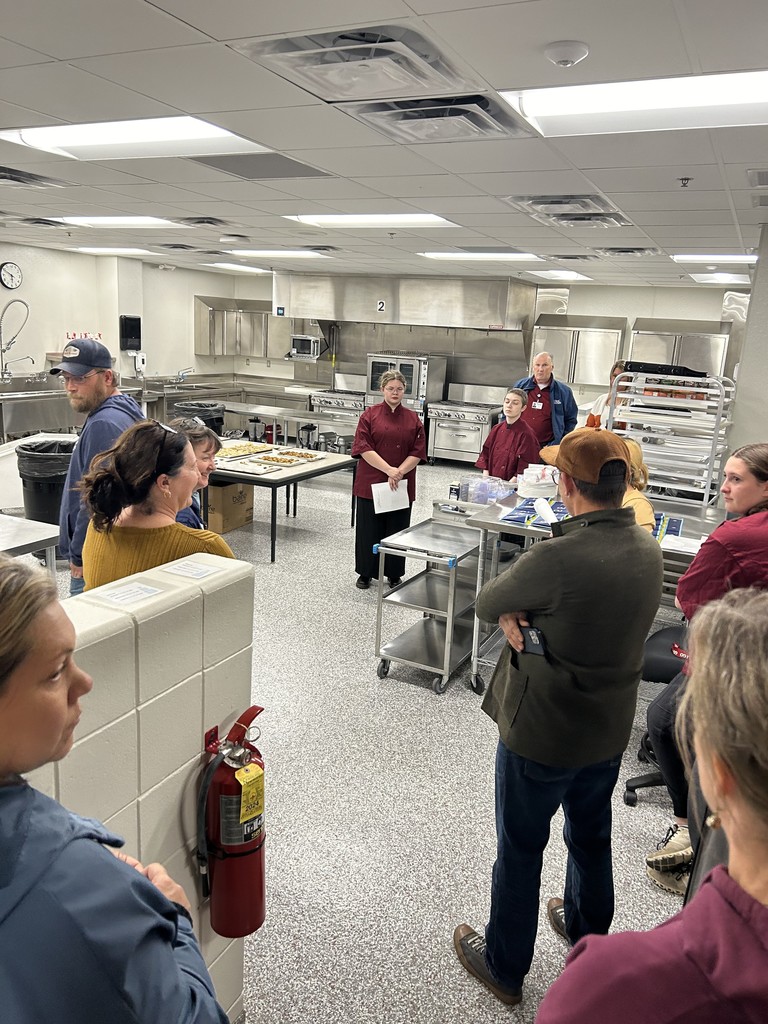 students and community members touring the new FACS room