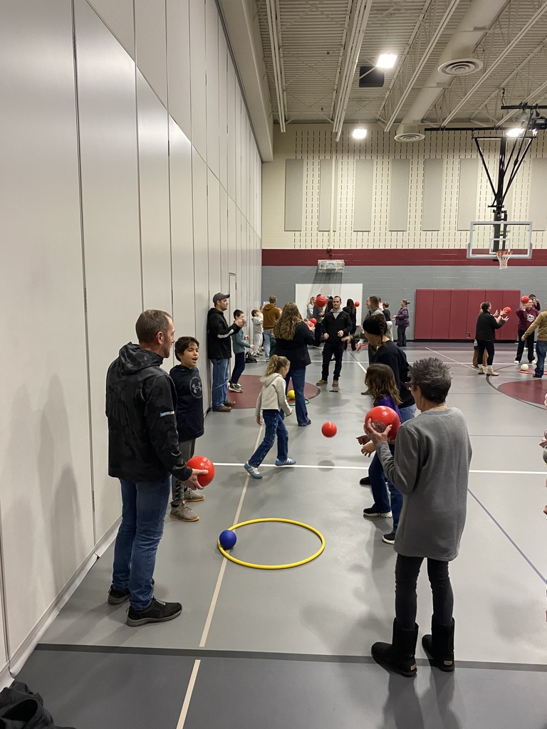 students playing games with their parents/guardians at their Expo