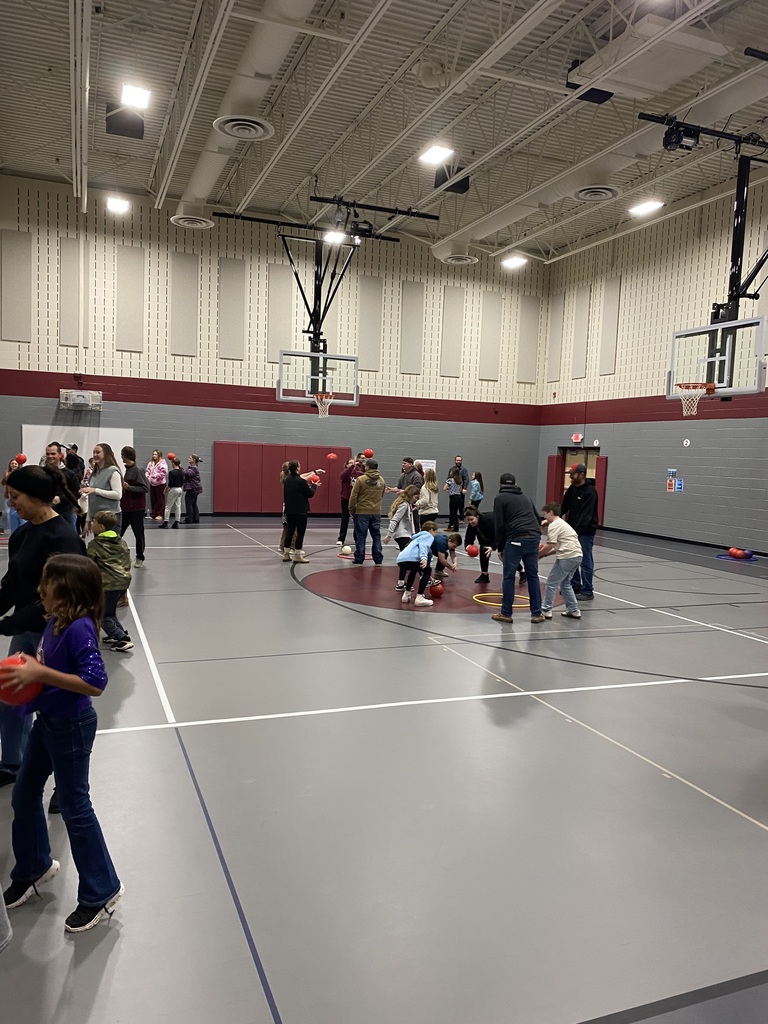 5th grade students playing interactive games with their parents at their Expo