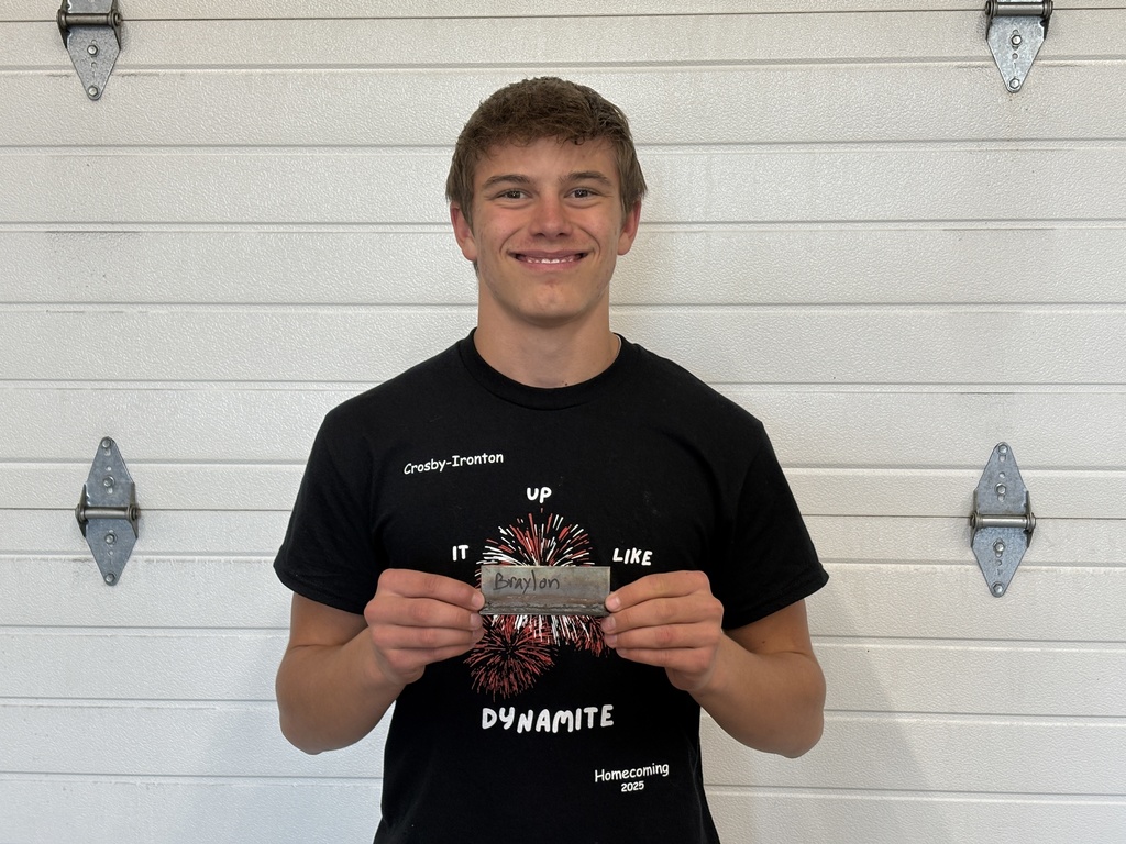 Braylon Kannel welder of the week holding his weld