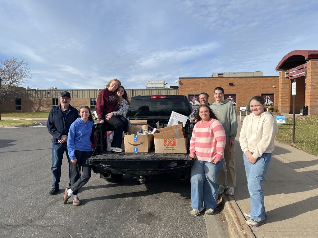 SALT members and two adults who helped gather 369 lbs of food on Halloween for the We Scare Hunger event on Halloween