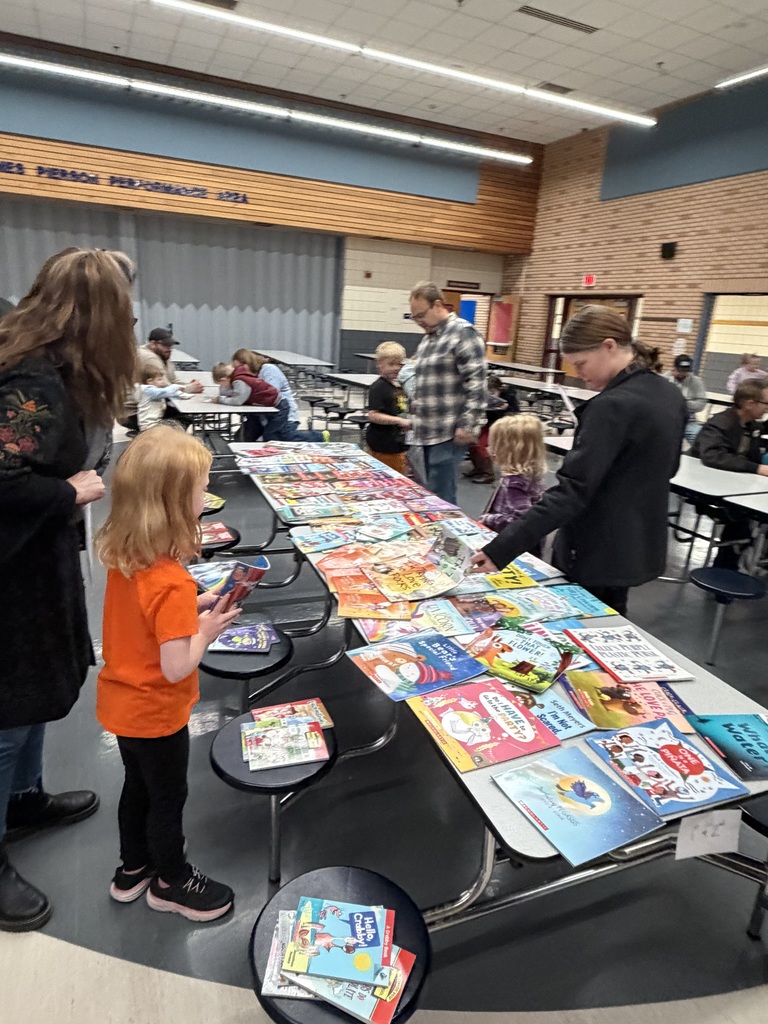 An entire table filled with books for the Fall Into Reading Event