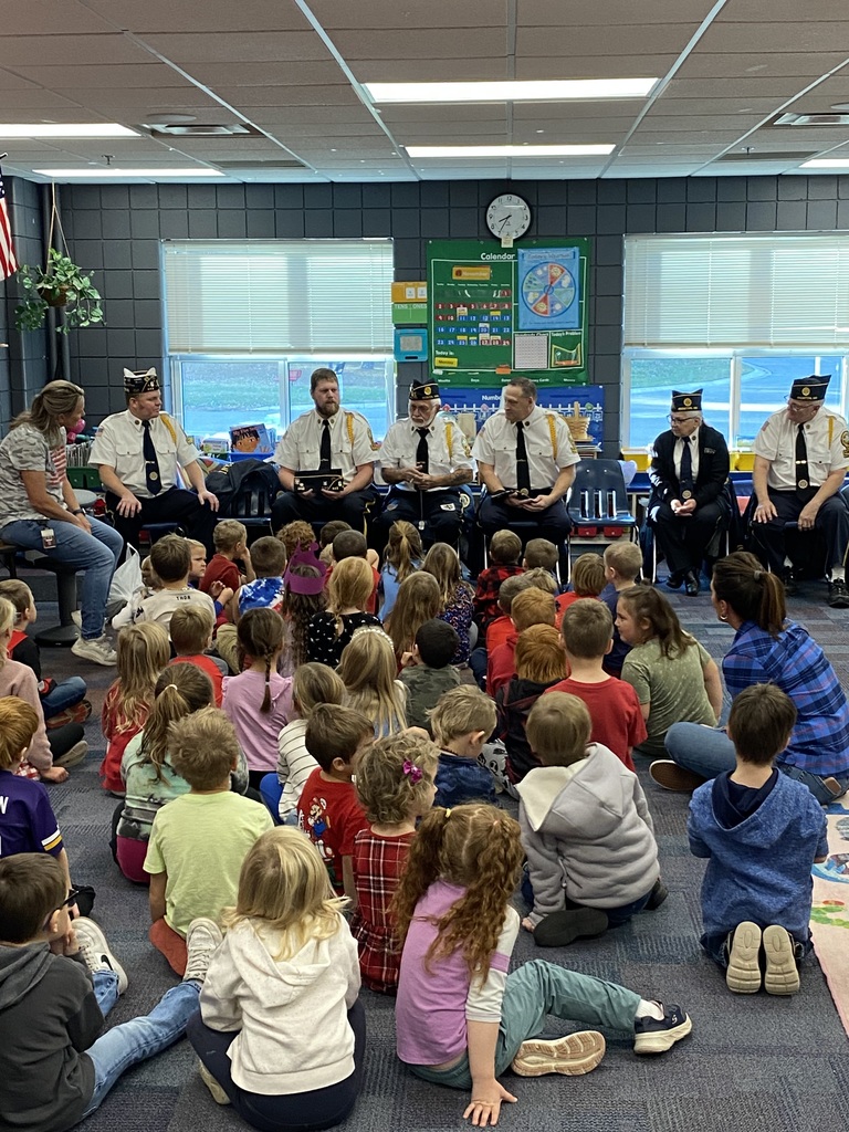 6 local veterans sitting in front of all of our kindergarteners telling stories of when and where they served in the military