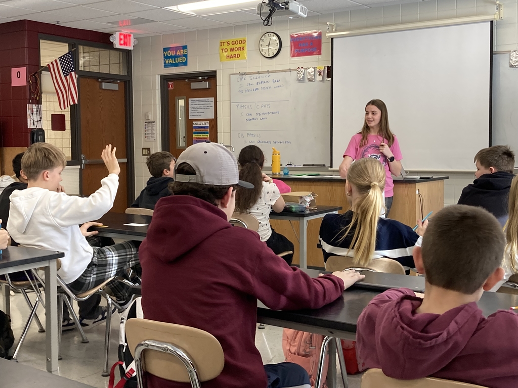 Link Leader in front of a 7th grade advisory class, one male is raising their hand