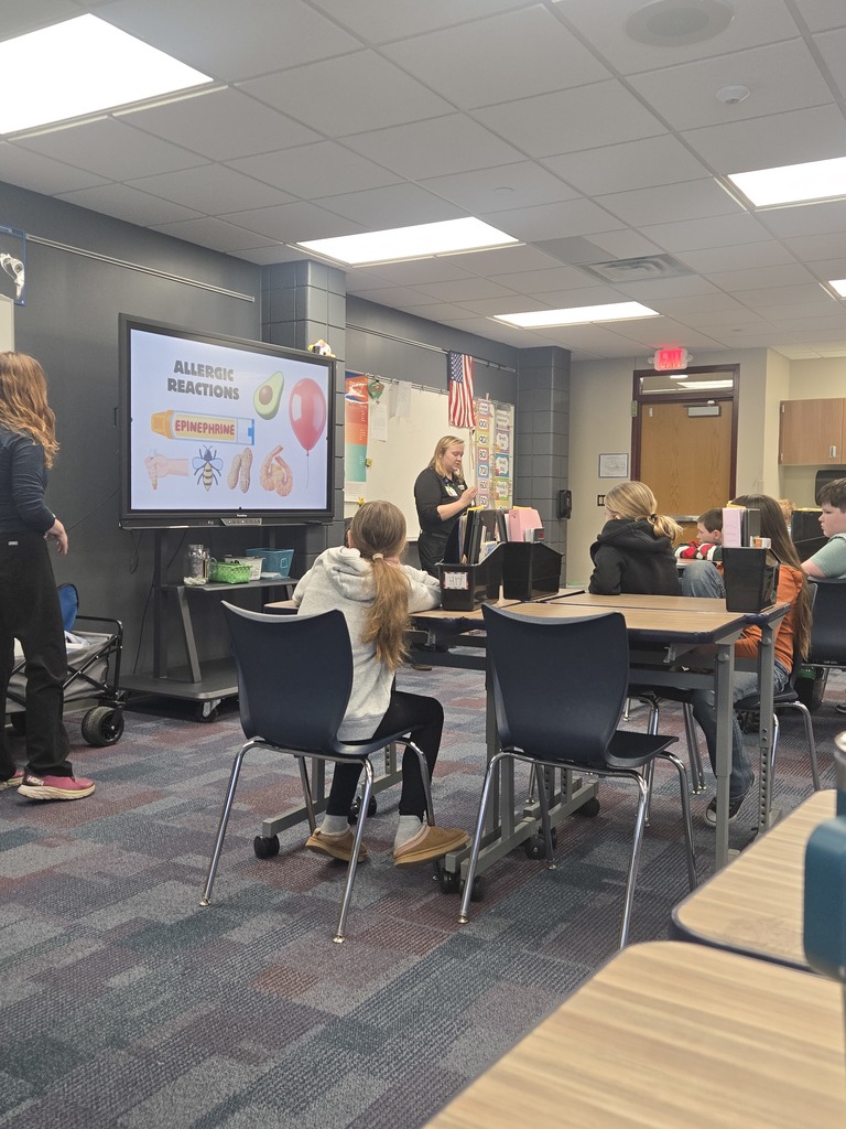 5th grade students listening to CRMC staff talk about allergic reactions