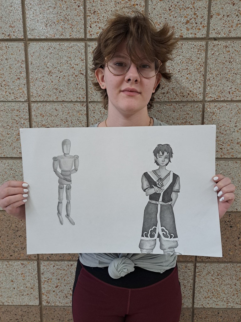 Female student with pencil drawing of a person
