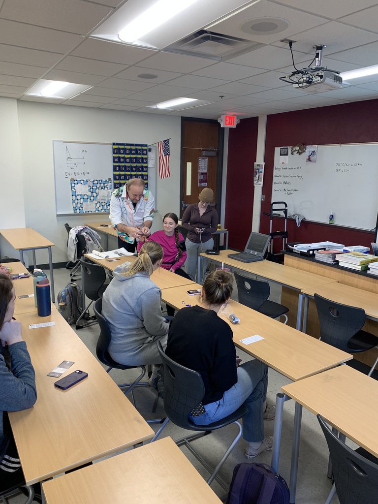 Student getting hooked up to a lie detector test