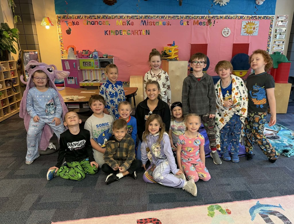 kindergartners sitting with nutritionist Miranda