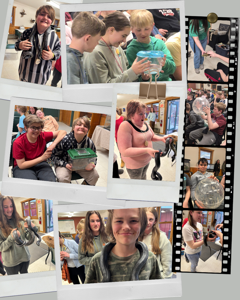 6th grade students at Long Lake holding snakes