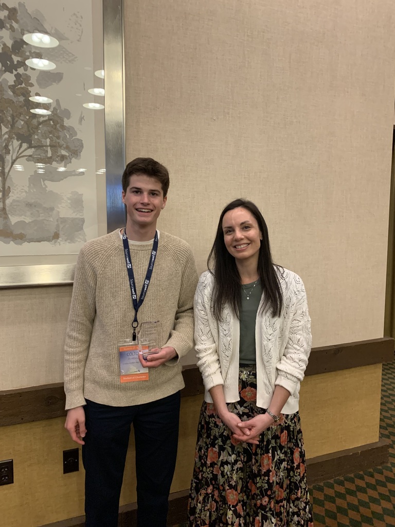 Colton and Ms. Lipski at the students of excellence awards