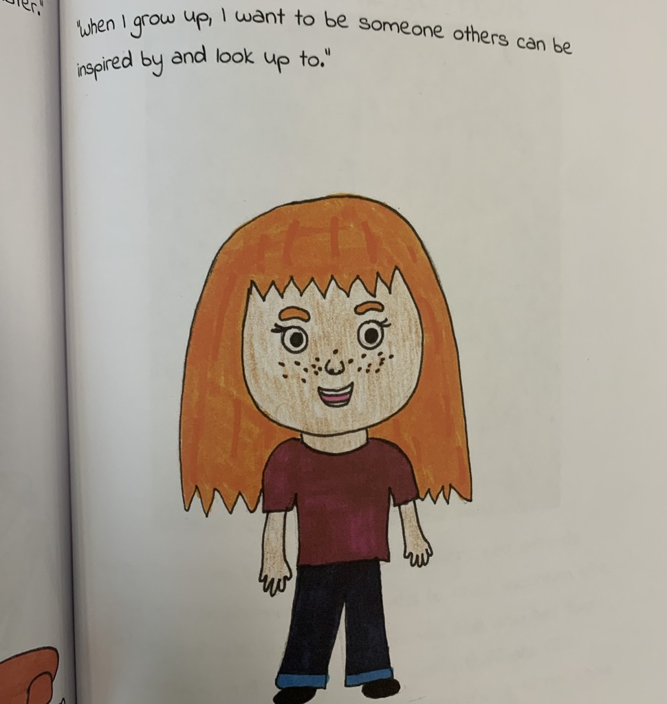an blurb from one of the children's books that says "when I grow up I want to be someone others can look up to and be inspired by"
