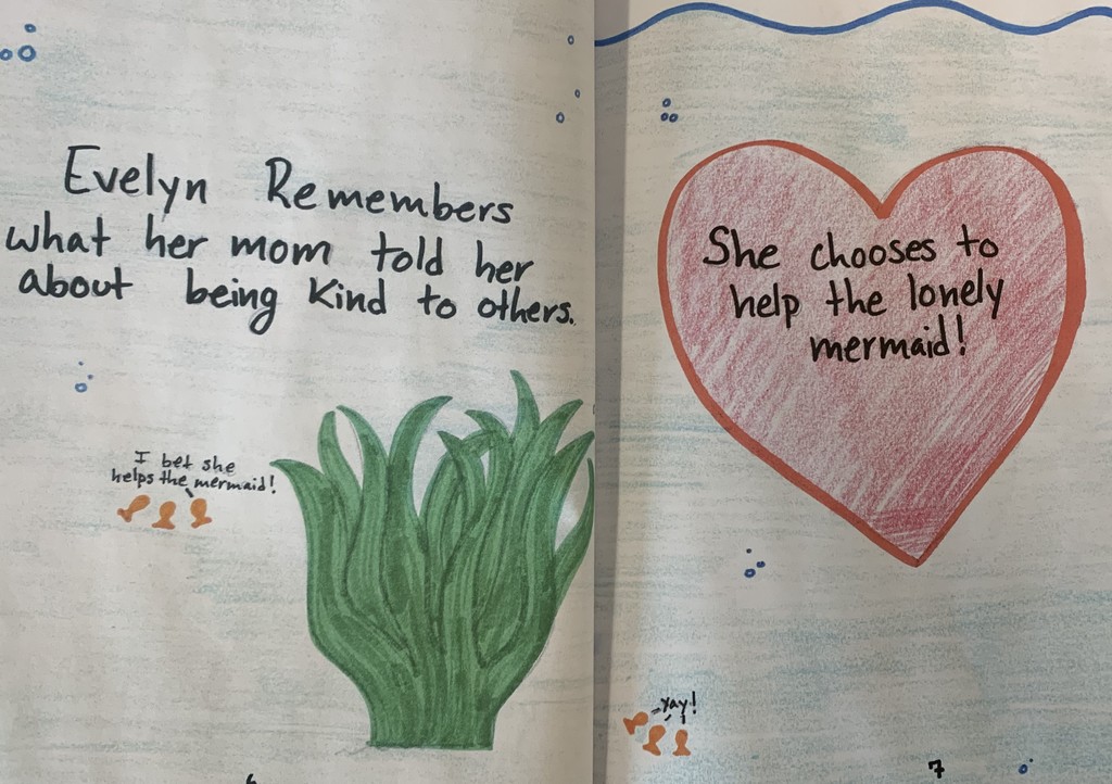a page from one of the children's books with a heart that says "she chooses to help the lovely mermaid"
