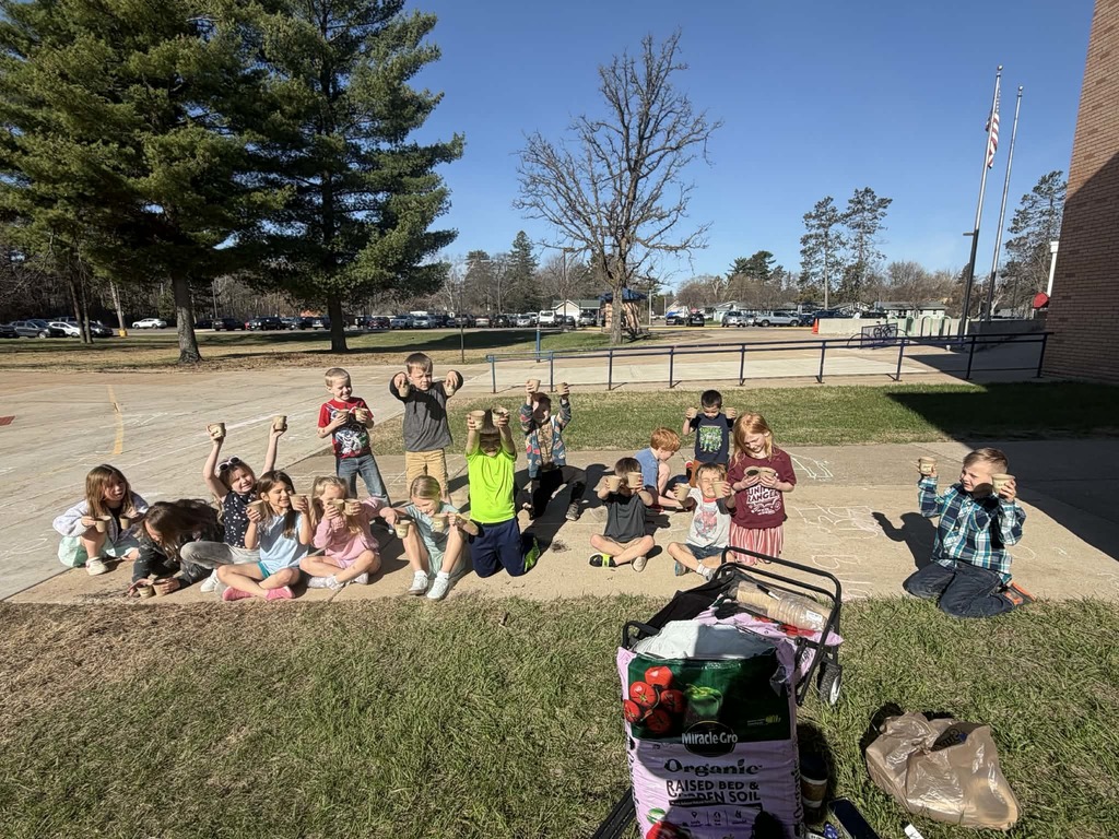 kindergartners planting veggie seeds