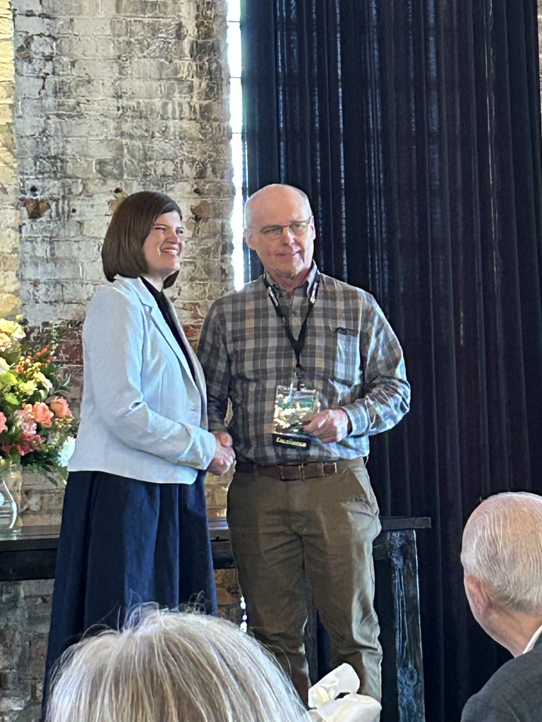 Mr. skinner receiving his pillar of excellence award