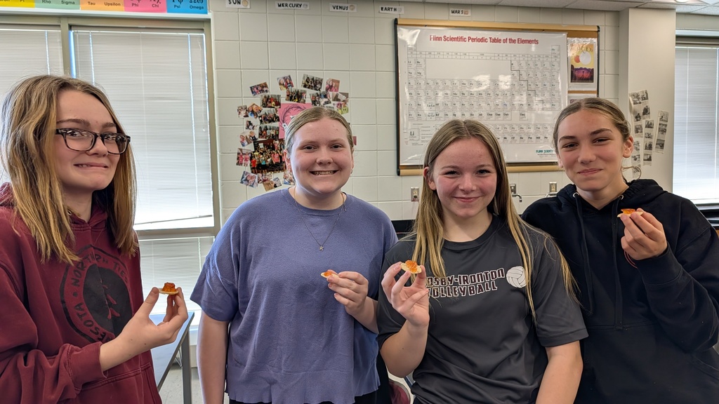 four 8th grade students trying prickly pear jelly