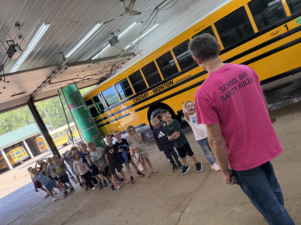 Josh talking to kindergartners at the bus garage