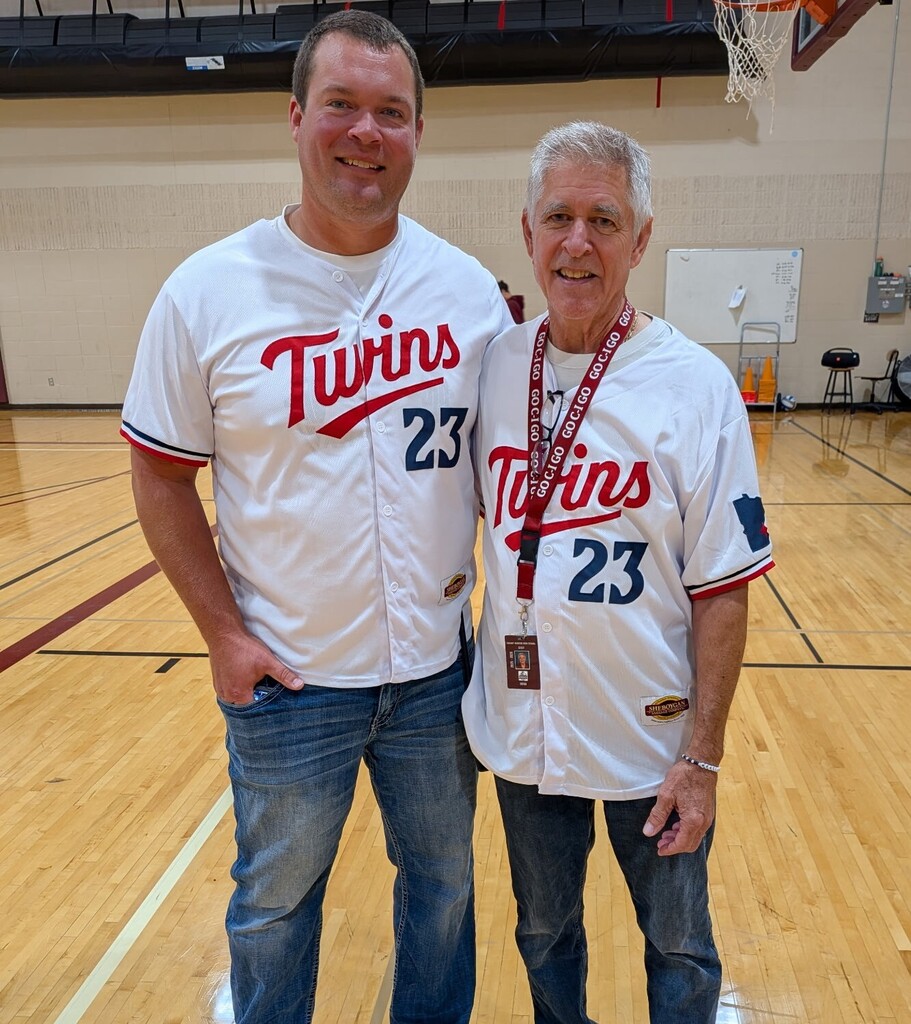 Mr. Cliff and Mr. Syrstad twinning in their Twins shirts
