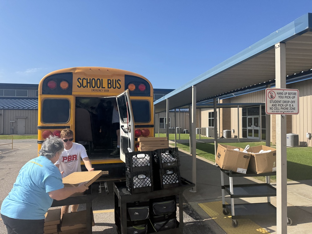 Loading the bus with summer meals