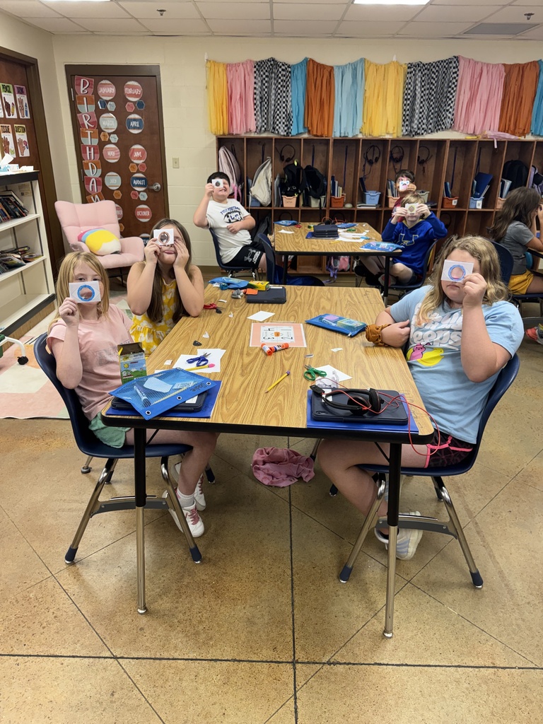 Students sitting at table