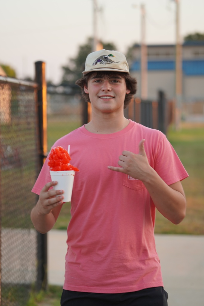 Kid eating snow cone