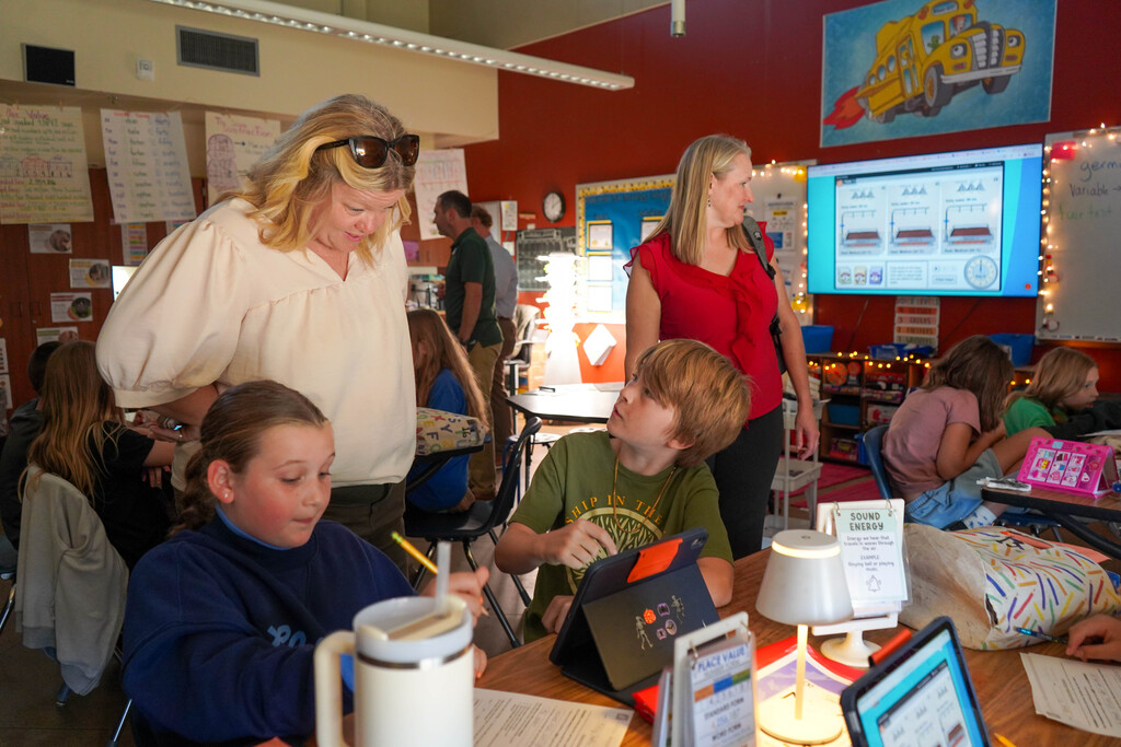 Apple visitors in classroom