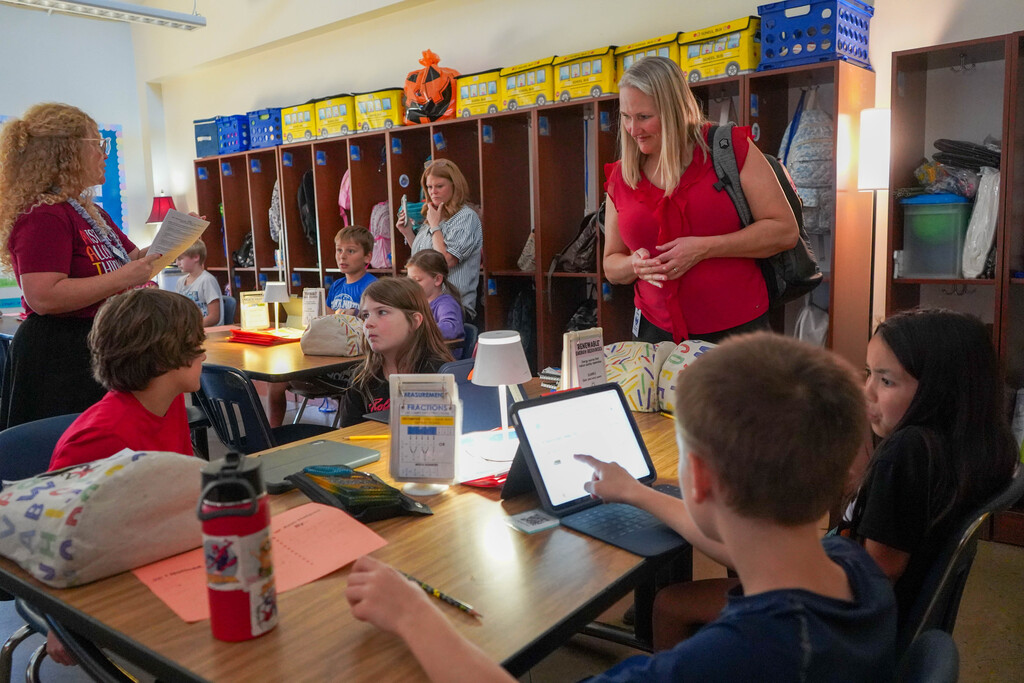 Apple visitors in classroom