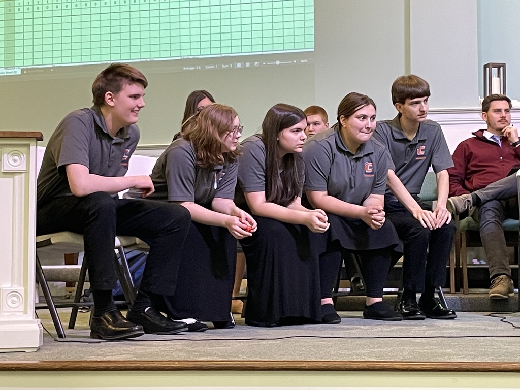 Students sitting in row