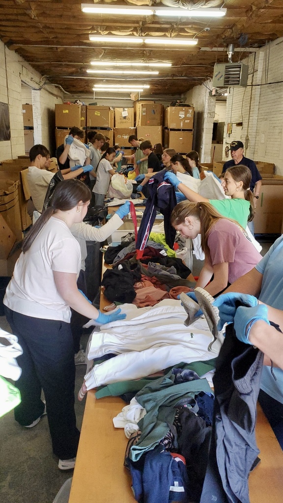 Students sorting clothes