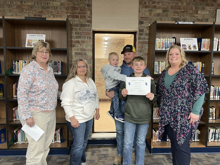 middle school student of the month and family plus school staff