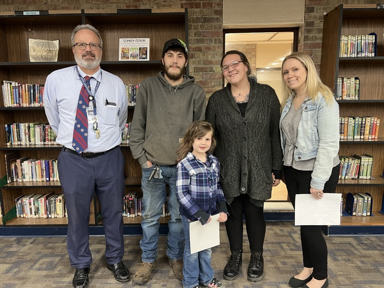 Frostick student of the month and family plus school staff