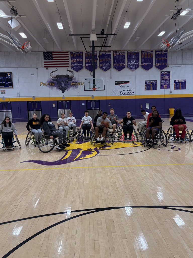 high school students playing basketball in wheelchairs