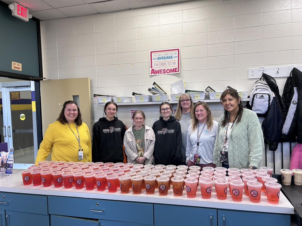picture of Cudahy High School staff with the donated drinks from 7 Brew