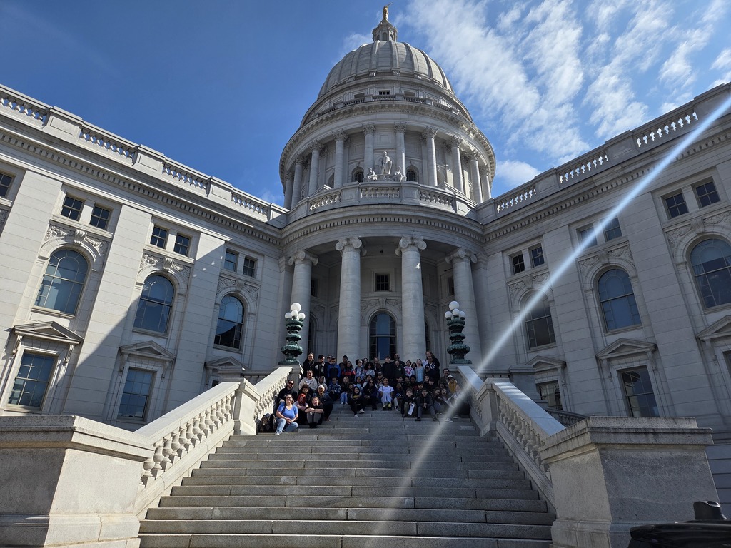 picture of students in the front of the capital building in Madison