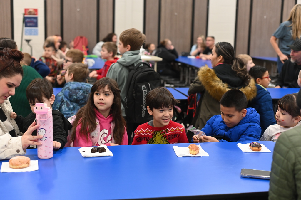 picture of students having donuts