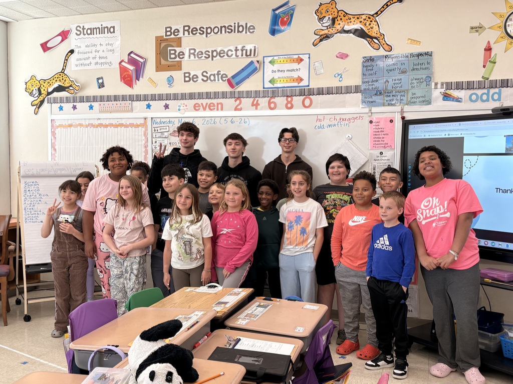 picture of International students with the Jones elementary students