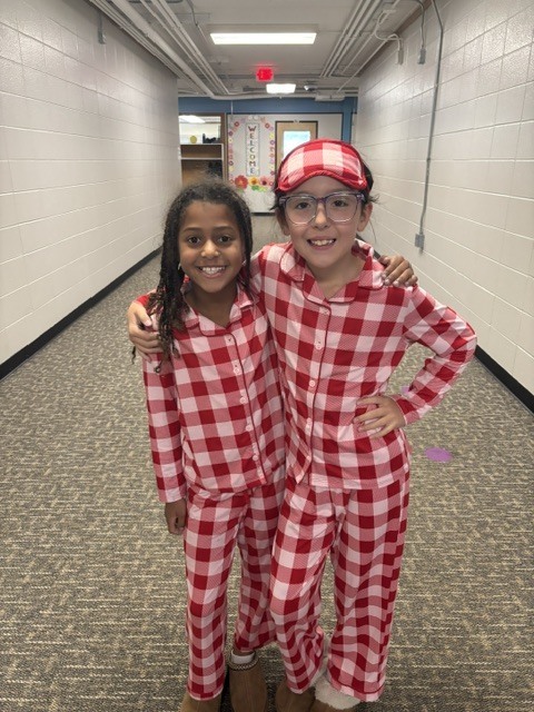 students in matching pjs