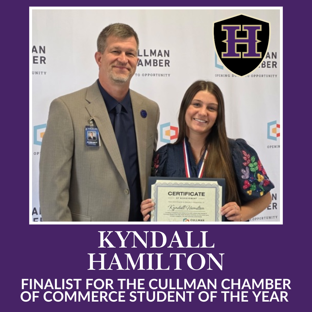 Dr. Barnette presents Kyndall Hamilton with a certificate for being a finalist in the Chamber of Commerce Student of the Year Award